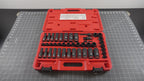 Putting the wrenches and sockets kit into the tool box